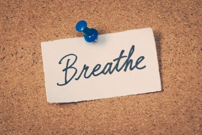 worrying about my health ? Word breathe pinned on a cork display board.