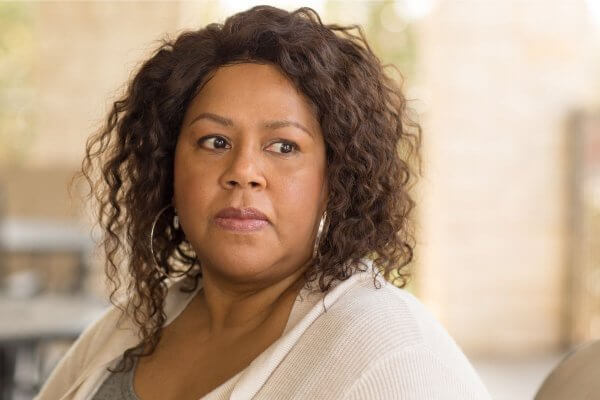Sad looking lady struggling with problems around Fibroids and Menopause.