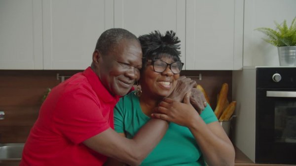 Photo of an older couple embracing- happy married years but could experience menopause bleeding after sex