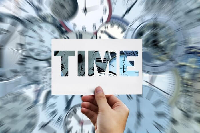 Hand holding inscription of Time - when is it best to take the morning after pill