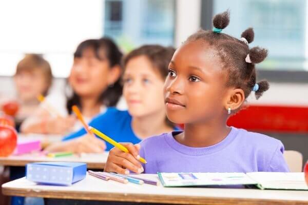 Kids in a classroom - what they hear in school is important; awareness is important when you want to talk to your kids about sex