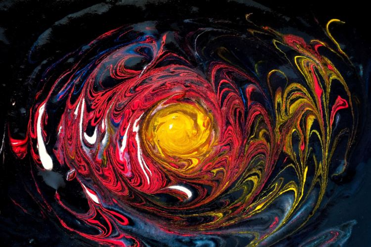 Whirl of red, yellow, orange colours, on a green/dark background like emotions swirling in a medical emergency.