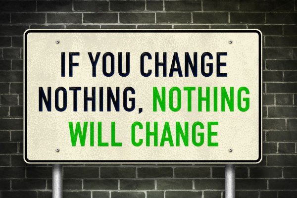 If you change nothing, nothing will change , sign on a grey wall