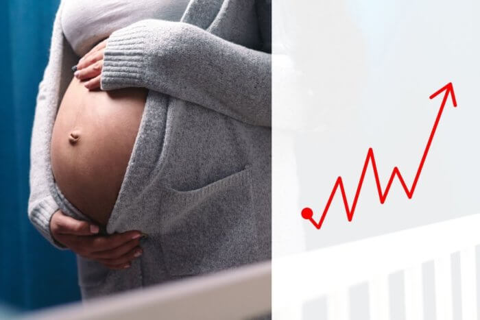 Image showing abdomen of a pregnant black lady with a graph -an image for postpartum bleeding
