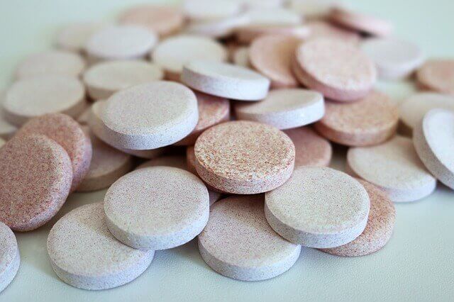 Image of a mix of drugs and pills showing drug misuse.